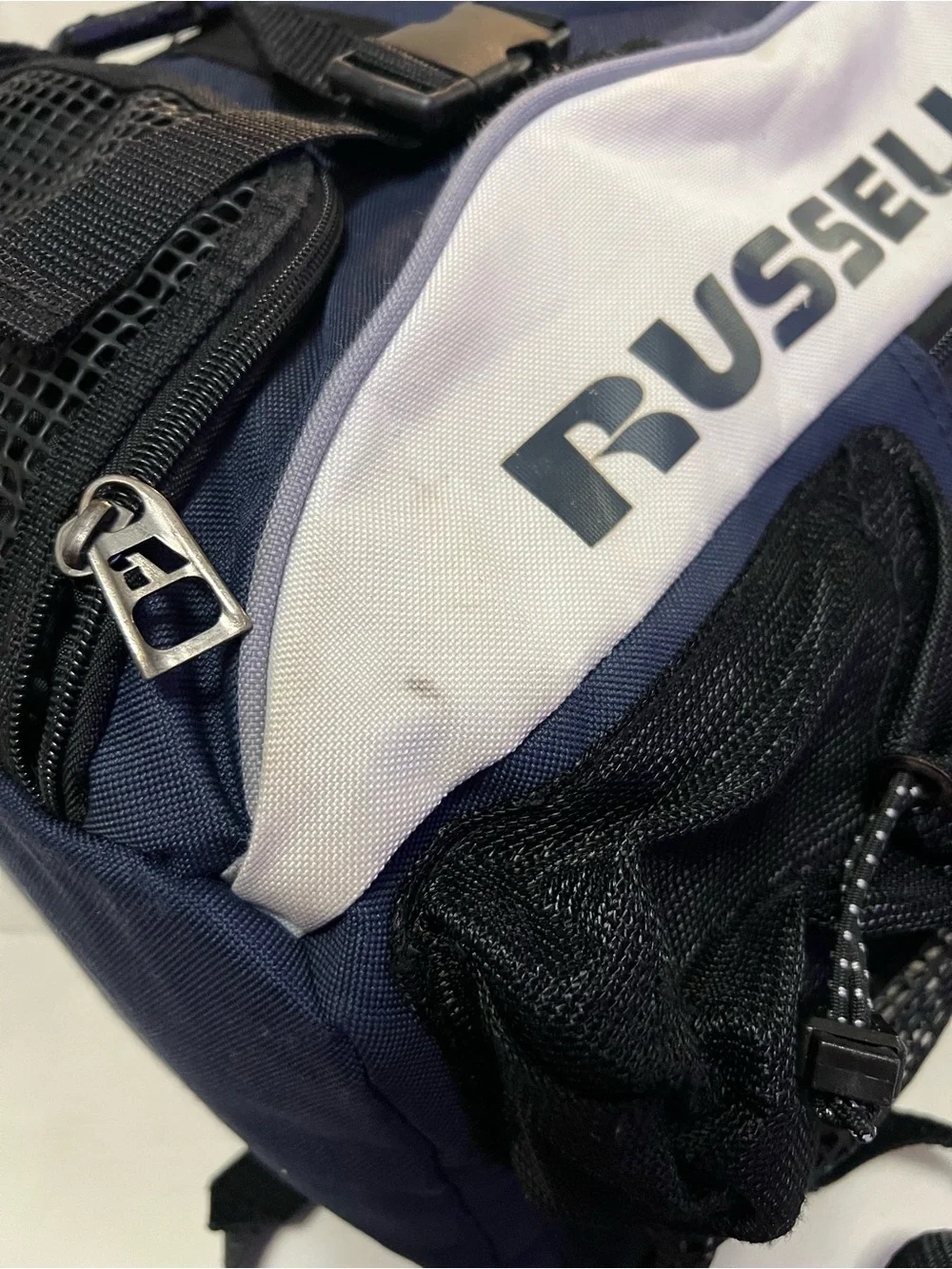 Russell Athletic Navy and White Backpack with Front Mesh Pocket